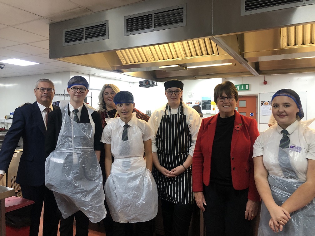 Springwell students with one of the catering students, Cllr Tricia Gilby and Chair of the Town Deal Board Ivan Fomin