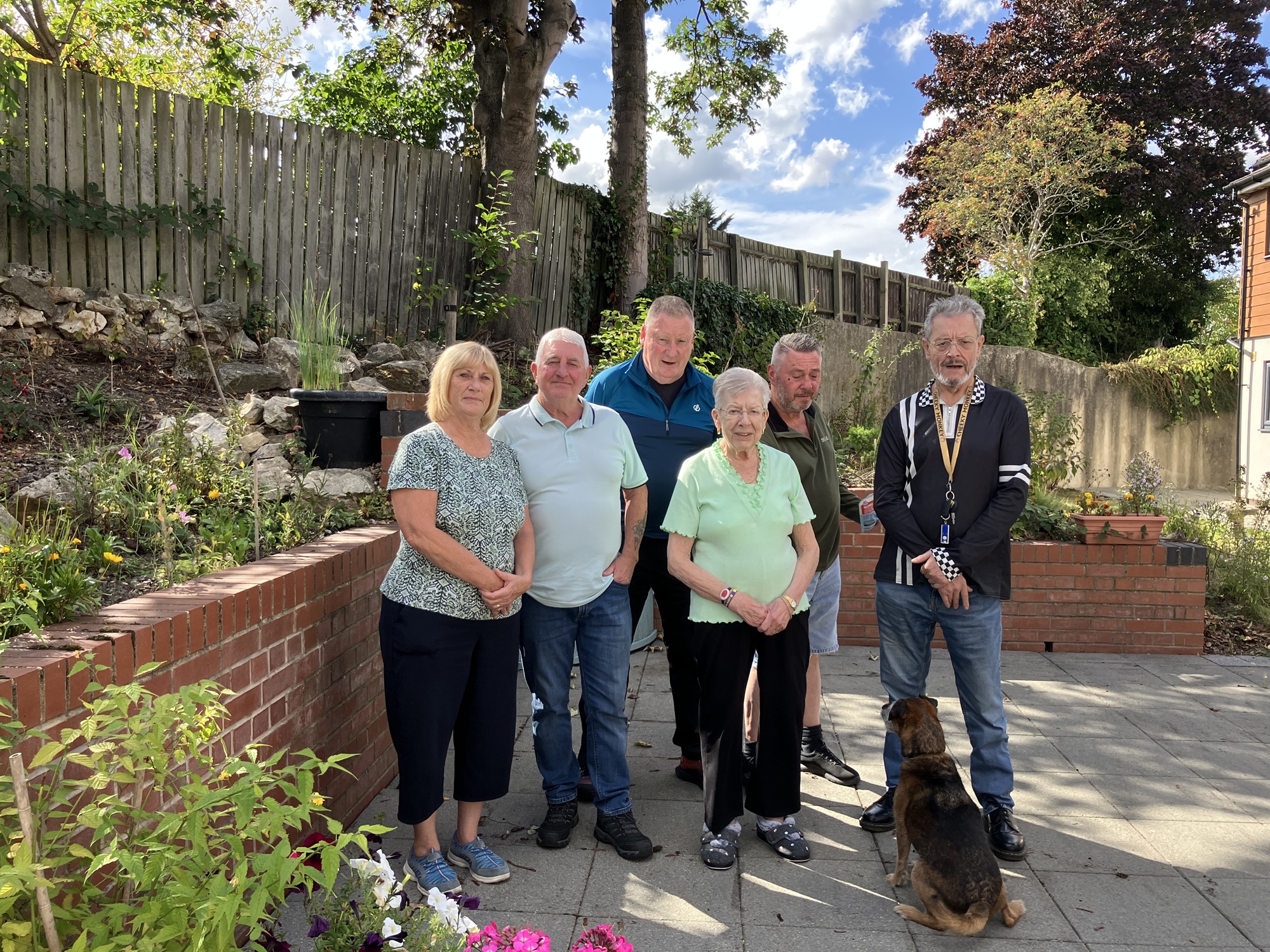 Residents in the communal garden at Glebe Court 