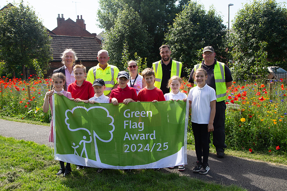 Cllr Steve Lismore with green spaces staff and Brampton Primary School children