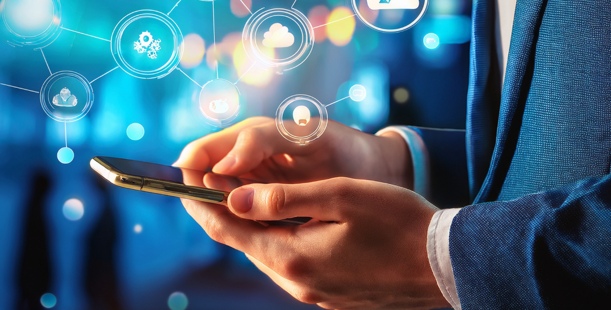 Person holding a smartphone with digital icons floating above the screen