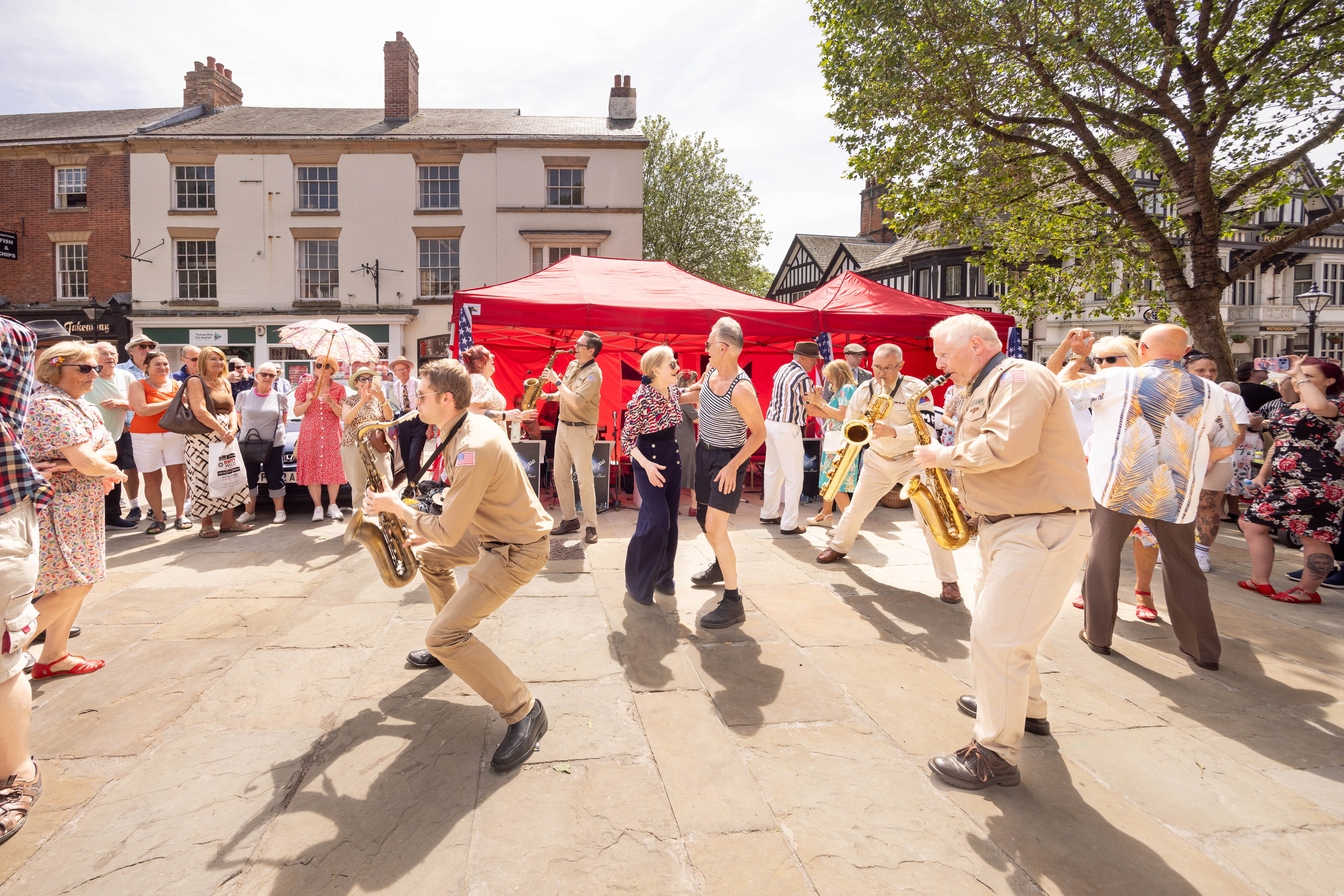 People dancing to live music in New Square 