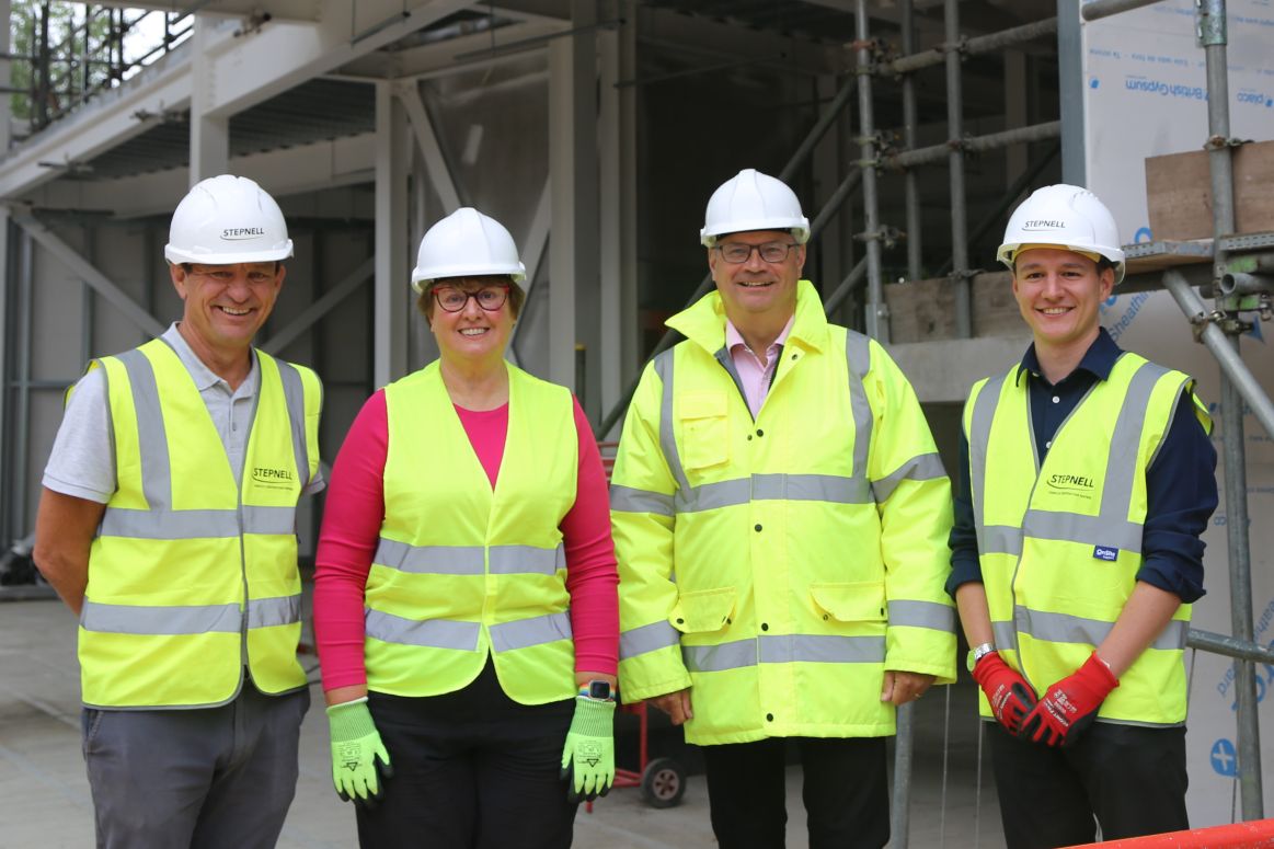 Councillor Tricia Gilby and Ivan Fomin with representatives from Stepnell