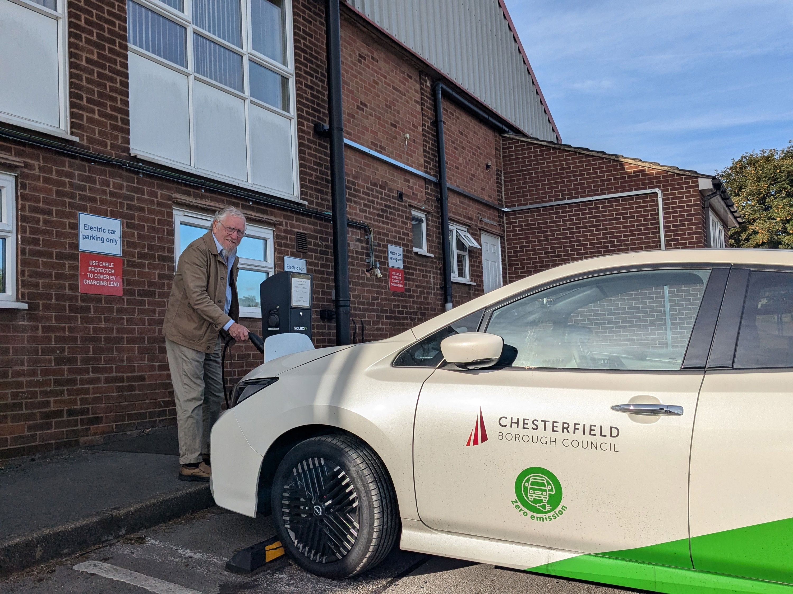 Councillor Stone with one of the new electric vehicles 