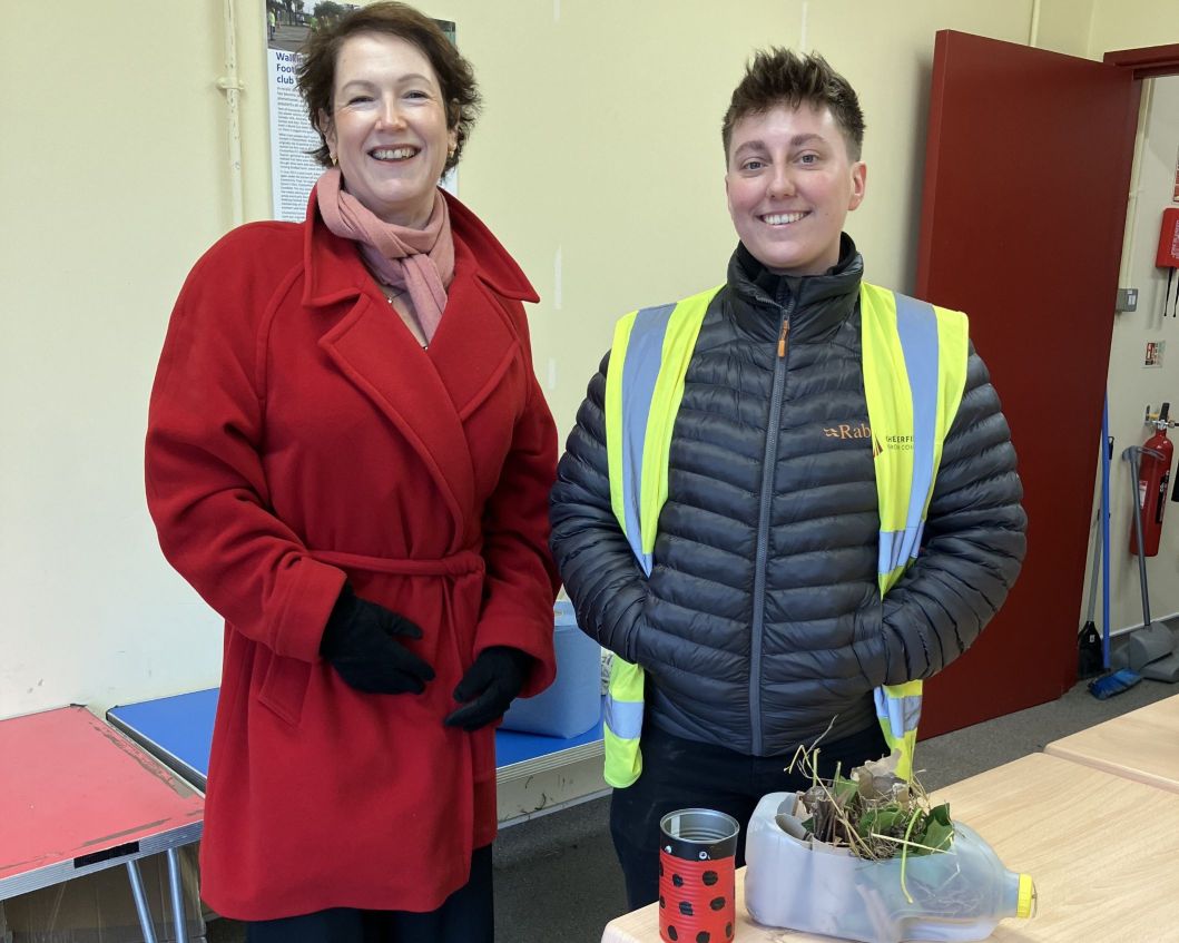 Cllr Amanda Serjeant with a member of the parks team at a bug hotel workshop