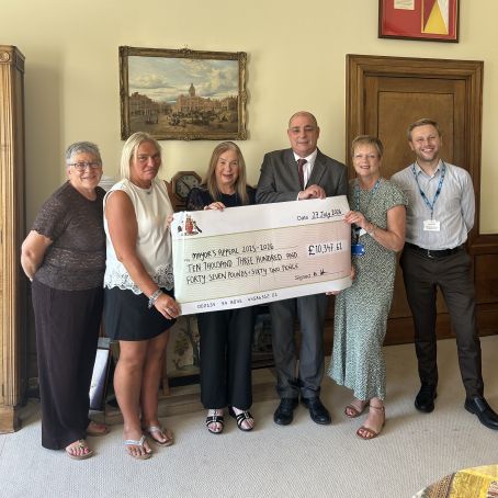 Cllr Barry Dyke And Marie Dyke Presenting A Cheque To Their Choosen Charities News Image