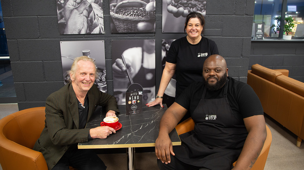 Councillor Steve Lismore with Coffee Stop staff members Amanda Johnson-Stafford and Dermot Kuyewawa.