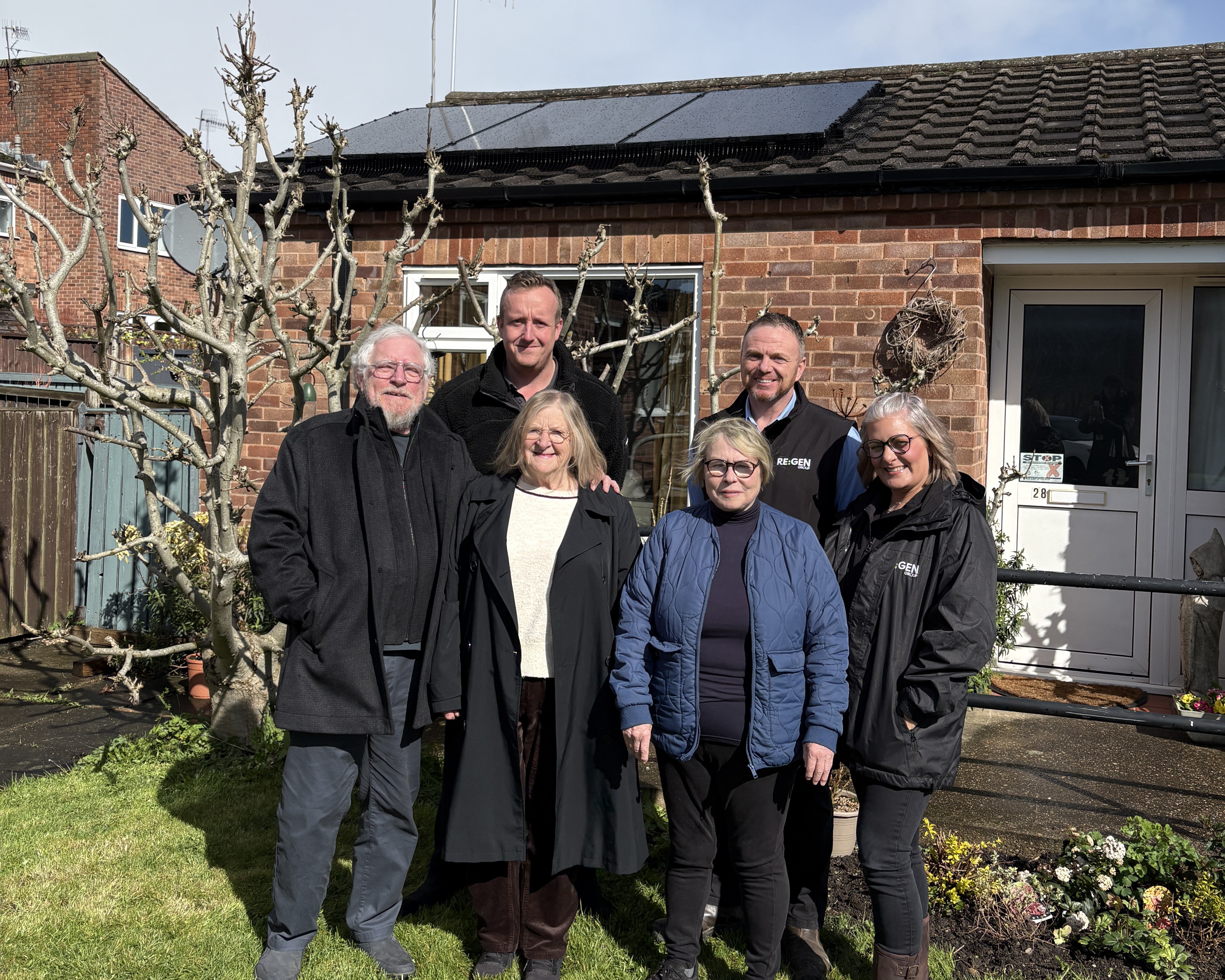 Councillors and RE:GEN YEM visiting a tenant already benefitting from energy efficient improvements to her home (l to r): Councillor Martin Stone, cabinet member for climate change, planning, and the environment; Paul Goodwin, New technologies and decarbonisation project manager; Councillor Jean Innes, cabinet member for housing; Ms Pearson who has recently had energy efficient upgrades made to her home; Scott Elliott, site manager RE:GEN YEM and Carrie Lawford, customer experience coordinator RE:GEN YEM