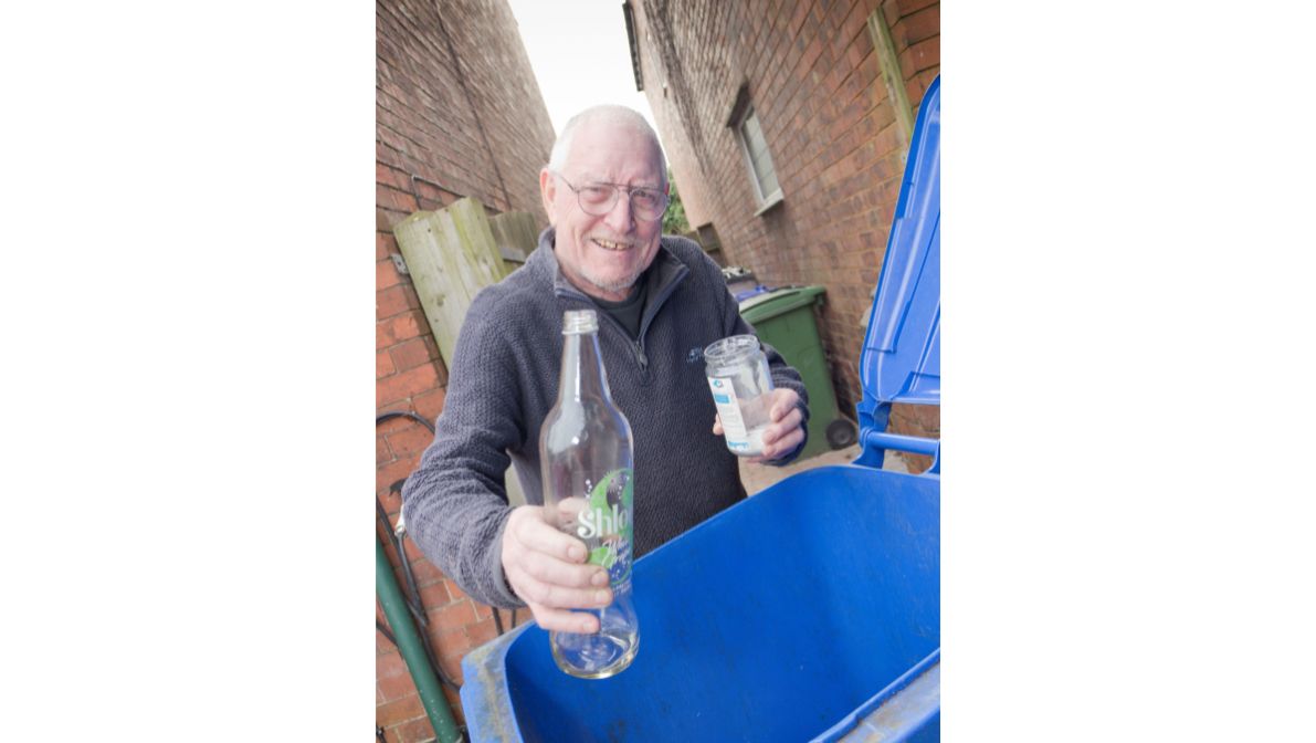 Cllr Martin Stone recycling glass in Chesterfield 